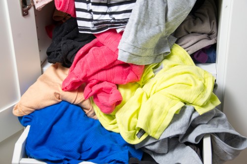 Professional movers handling furniture in Colindale